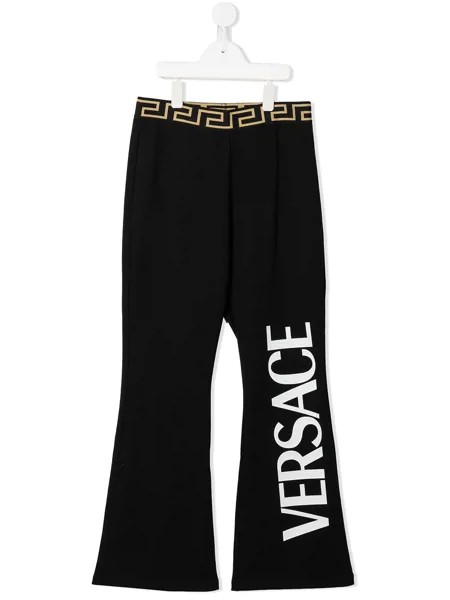 Versace Kids расклешенные спортивные брюки с узором Greca