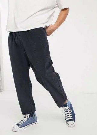 Вельветовые брюки с заниженным шаговым швом темно-синего цвета ASOS DESIGN-Темно-синий