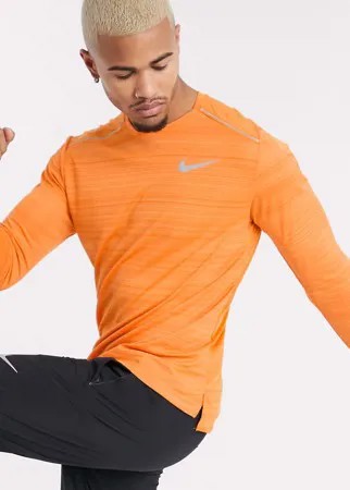 Оранжевый лонгслив Nike Running Miler