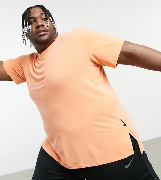 Оранжевая футболка Nike Yoga Plus-Оранжевый