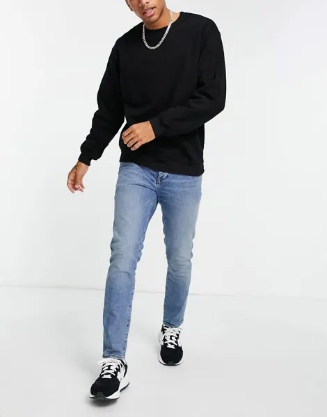 Светло-синие выбеленные джинсы стрейч узкого кроя плотностью 12,5 унц. ASOS DESIGN-Голубой