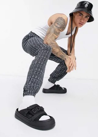 Черные шлепанцы с ремешком, на массивной подошве ASOS DESIGN-Черный цвет