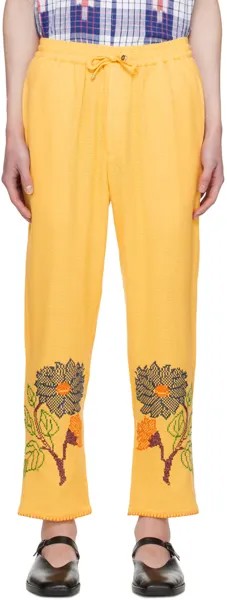 Желтые брюки с вышивкой крестиком Harago