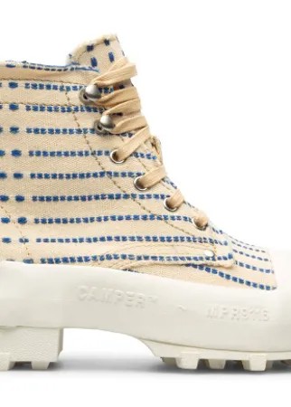Vulcanized patterned textile boots with toothed rubber outsoles and OrthoLite® cushioned footbed. Made in collaboration with EFI