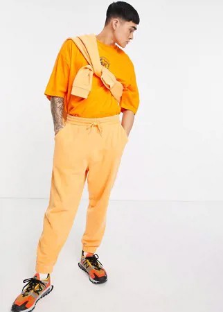Oversized-джоггеры из органического хлопка винтажного выбеленного оранжевого цвета (от комплекта) ASOS DESIGN-Оранжевый цвет