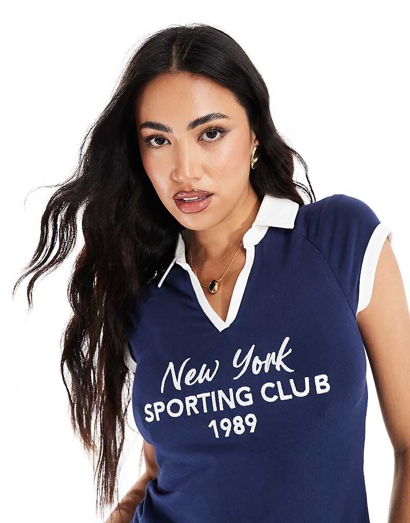 Темно-синяя укороченная рубашка-поло с надписью «New York» ASOS DESIGN
