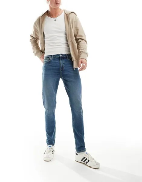 Винтажные джинсы скинни средней потертости ASOS DESIGN