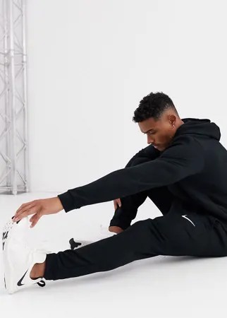Черные суженные книзу флисовые джоггеры из ткани Dri-Fit Nike Training-Черный