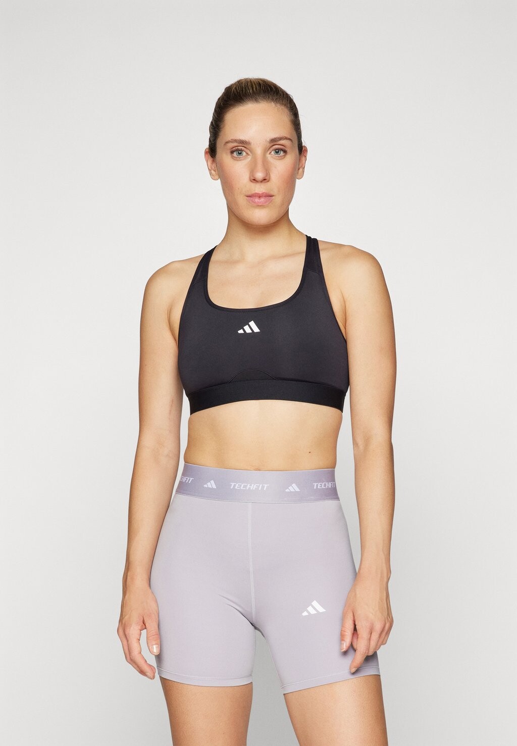 Спортивный бюстгальтер средней поддержки POWERREACT BRA adidas, черный