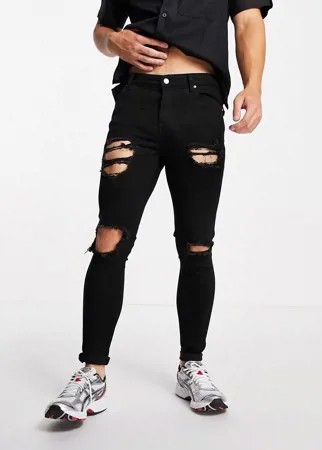 Черные эластичные джинсы с рваной отделкой ASOS DESIGN-Черный цвет