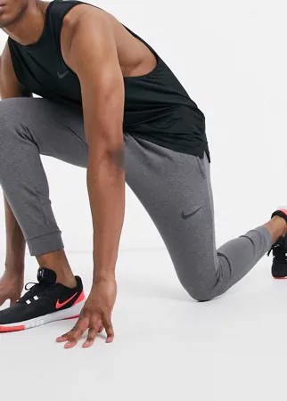 Суженные книзу флисовые джоггеры темно-серого цвета Nike Training Dry-Серый