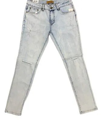 Узкие рваные отбеливающие джинсы стрейч на платформе 100