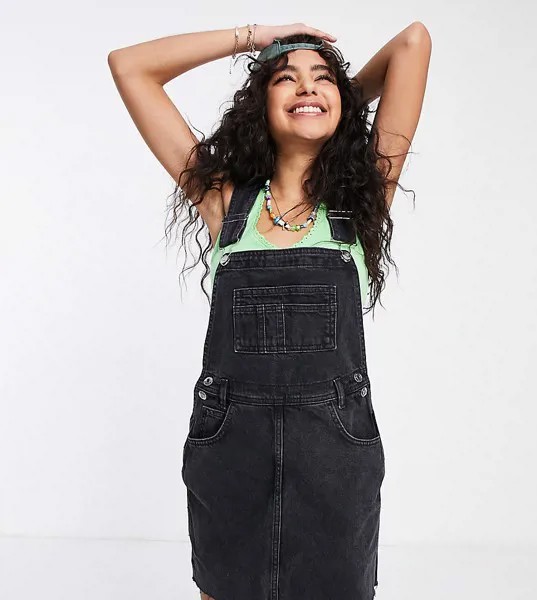 Выбеленный черный сарафан из денима ASOS DESIGN Petite