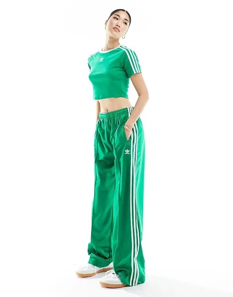 Зеленые спортивные брюки adidas Originals adicolor Firebird