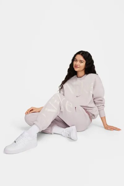 Спортивные брюки с зауженными штанинами и косыми карманами Nike, фиолетовый