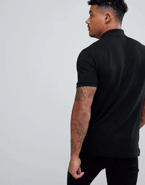 Черное приталенное поло из пике Lacoste