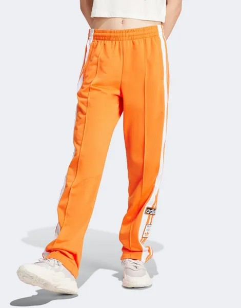 Оранжевые спортивные брюки adidas Adibreak