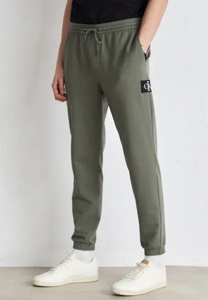 Тренировочные брюки Calvin Klein Jeans, зеленый