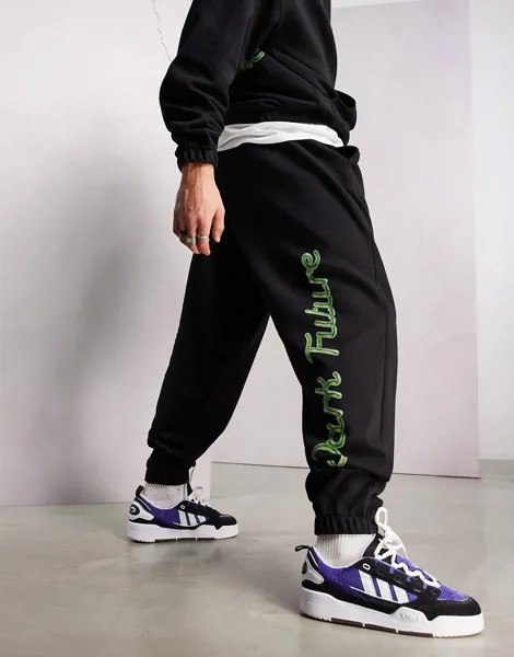 Черные джоггеры в стиле oversized с графическим принтом логотипа от комплекта ASOS Dark Future-Черный