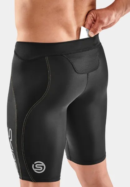 Короткие спортивные штаны Skins, черно-желтые