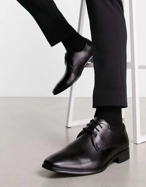 Офисные туфли на шнуровке черного цвета из кожи
