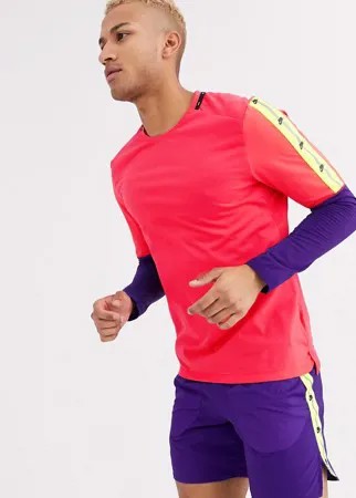 Розовый лонгслив Nike Running Run Wild Pack