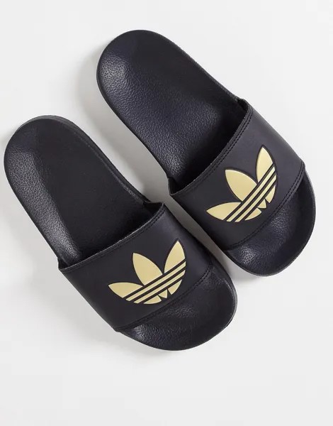 Черные шлепанцы adidas Originals Adilette lite с золотым трилистником