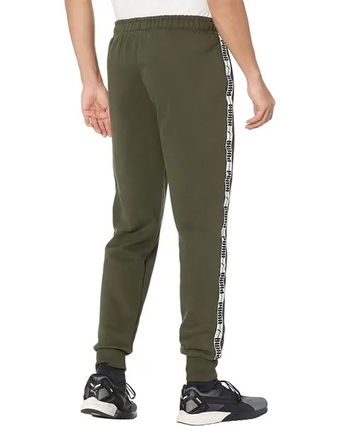 Брюки PUMA Taping Pants Fleece, цвет Forest Night/Puma White