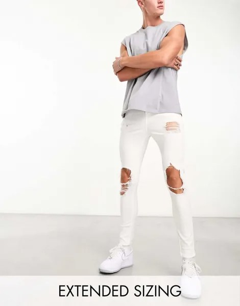 Белые эластичные джинсы с сильными рваными краями ASOS DESIGN