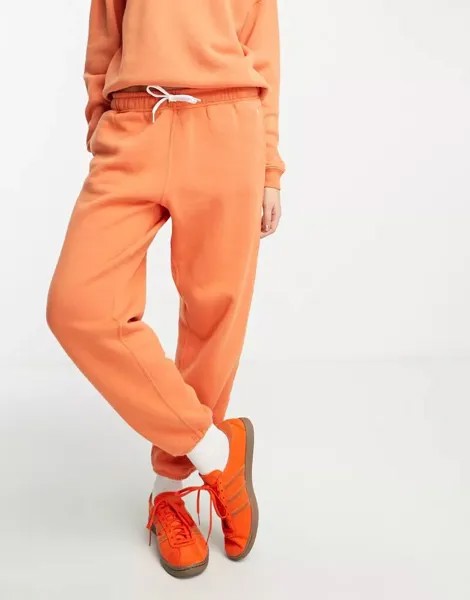 Оранжевые спортивные брюки с логотипом бренда и манжетами Polo Ralph Lauren, однородные