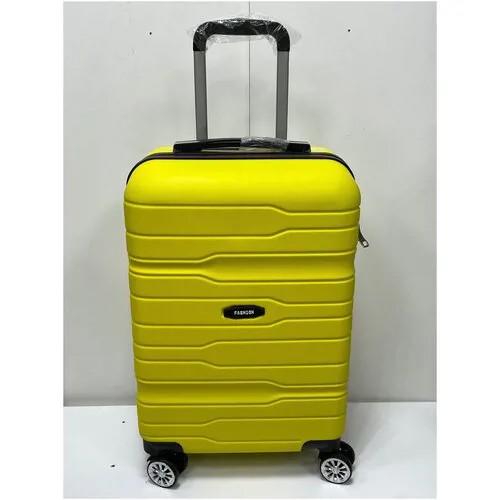 Чемодан на 4-х колесах неубиваемый из АВС пластика, марки FASHION цвет желтый, размер S 55х20х35, вес 2,5 кг ручная кладь