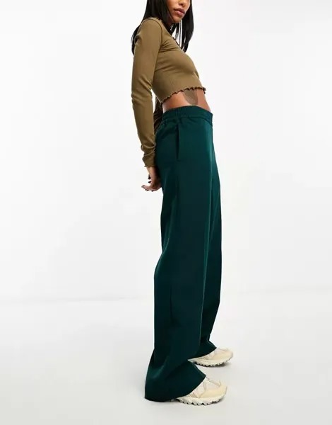 Темно-зеленые расклешенные брюки с завышенной талией Monki