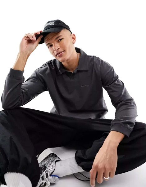 Черная футболка-поло New Balance с длинными рукавами
