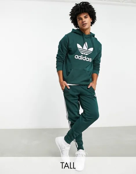 Зеленые джоггеры с тремя полосками adidas Originals Tall adicolor