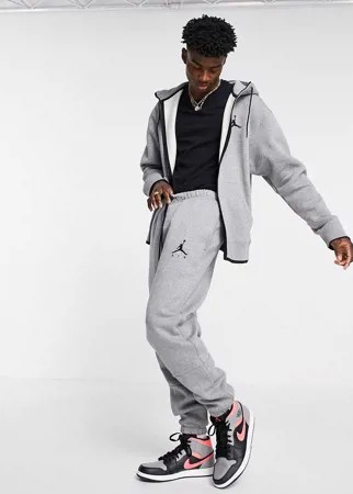 Серые джоггеры с манжетами Nike Jordan Jumpman-Серый