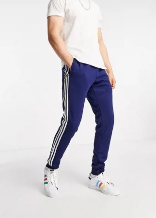 Темно-синие джоггеры с тремя полосками adidas Originals adicolor-Темно-синий