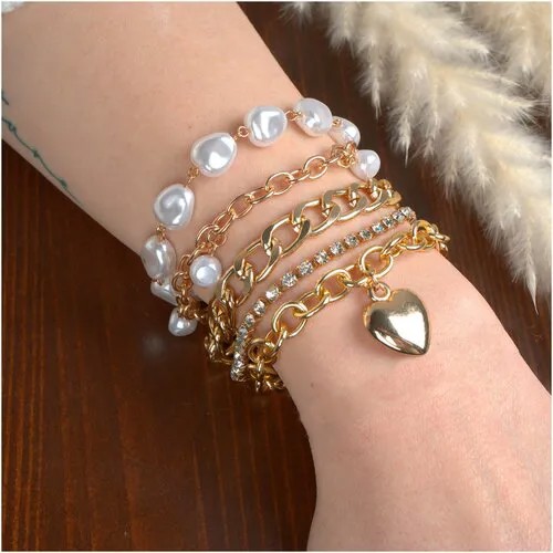 Браслет-цепочка The Minimalist, кристаллы Preciosa, кристаллы Swarovski, жемчуг пресноводный, металл, жемчуг Swarovski синтетический, искусственный камень, стразы, кристалл, Swarovski Zirconia, пластик, акрил, жемчуг имитация, жемчуг культивированный, нанокристалл, размер 20 см., размер S, диаметр 10 см., желтый, бежевый