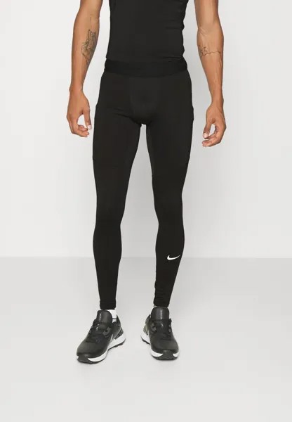Спортивные брюки Nike M Np Warm Tght, черный / (белый)