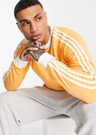 Оранжевый лонгслив с тремя полосками adidas Originals adicolor-Оранжевый цвет