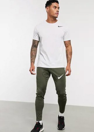 Узкие джоггеры цвета хаки Nike Football Strike-Зеленый