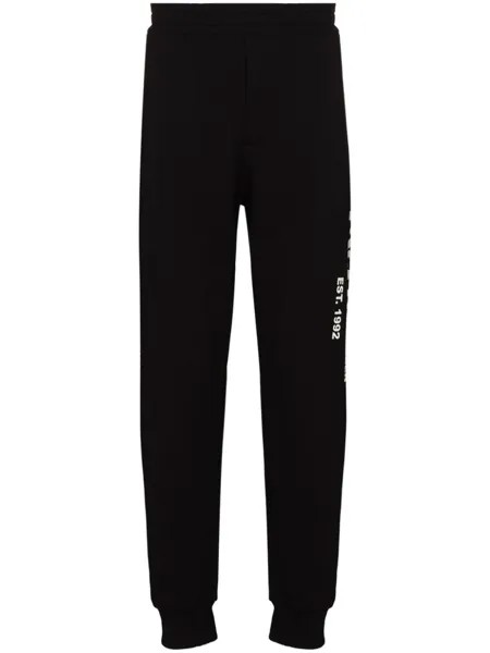 Alexander McQueen спортивные брюки с принтом граффити, черный