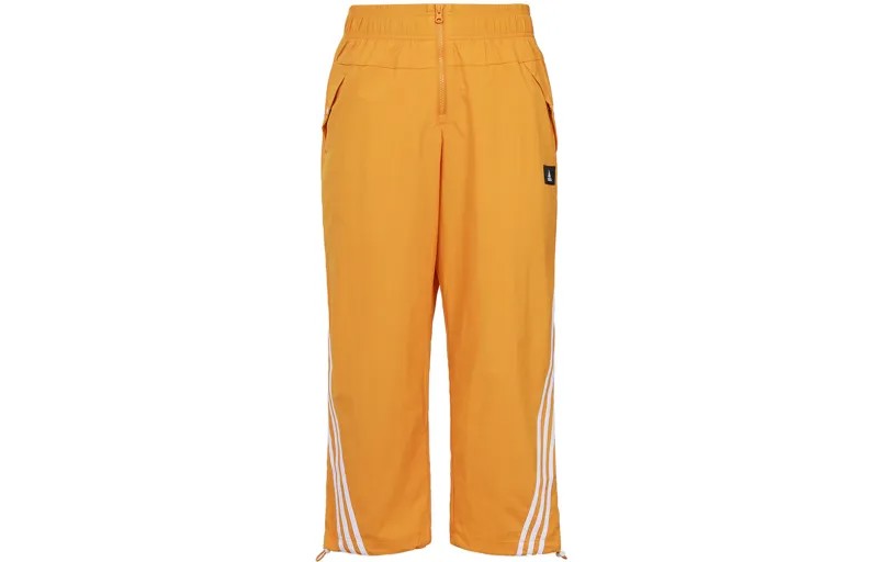 Трикотажные спортивные штаны женские оранжевые Adidas