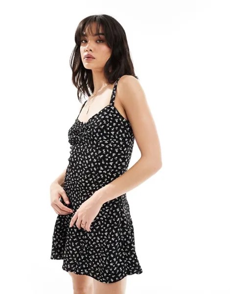Bershka – черное мини-платье с бантом и белым цветочным узором
