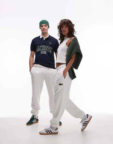 Lacoste – белые спортивные штаны с логотипом